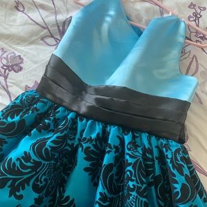 Beautiful girls dress with damask full skirt.